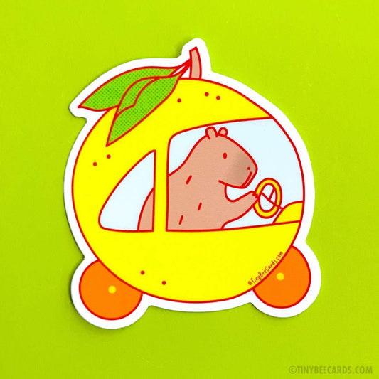 Capybara Driving a Yuzu Car Vinyl Sticker